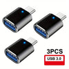 Three black USB-C to USB-A adapters for data transfer