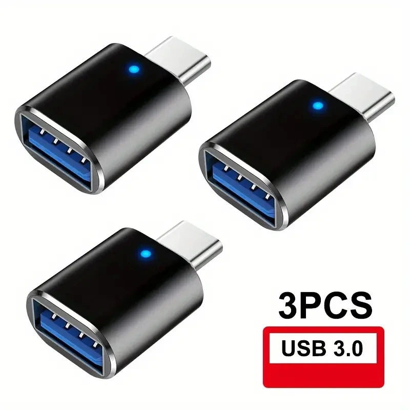 Three black USB-C to USB-A adapters for data transfer