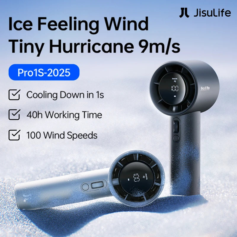 A silver handheld ice feeling wind fan with an LED display is shown resting on a snowy surface.