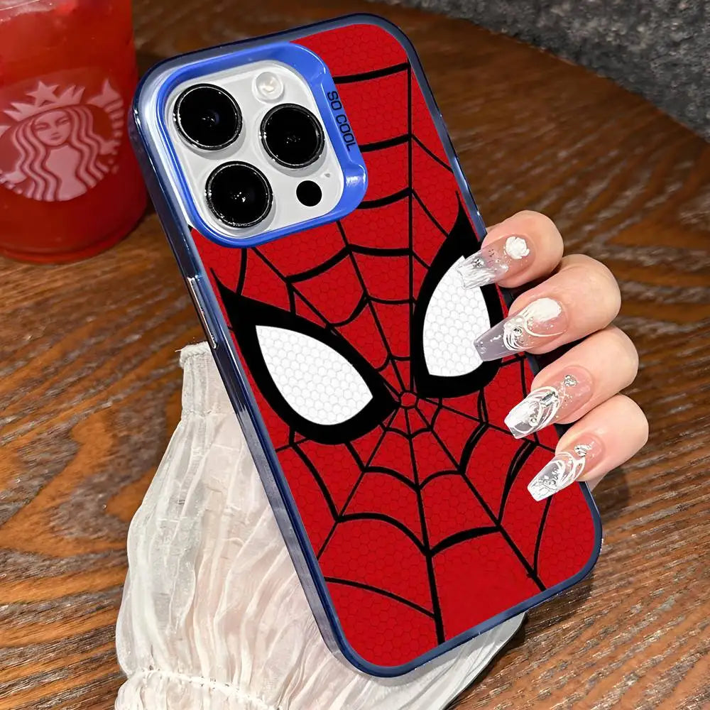 A close-up of an anime Spider-Man face phone case with a red background and white spiderweb design being held by a hand.