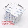 A stack of white double-coated tissue tape measuring 43mm wide by 54.5mm long.