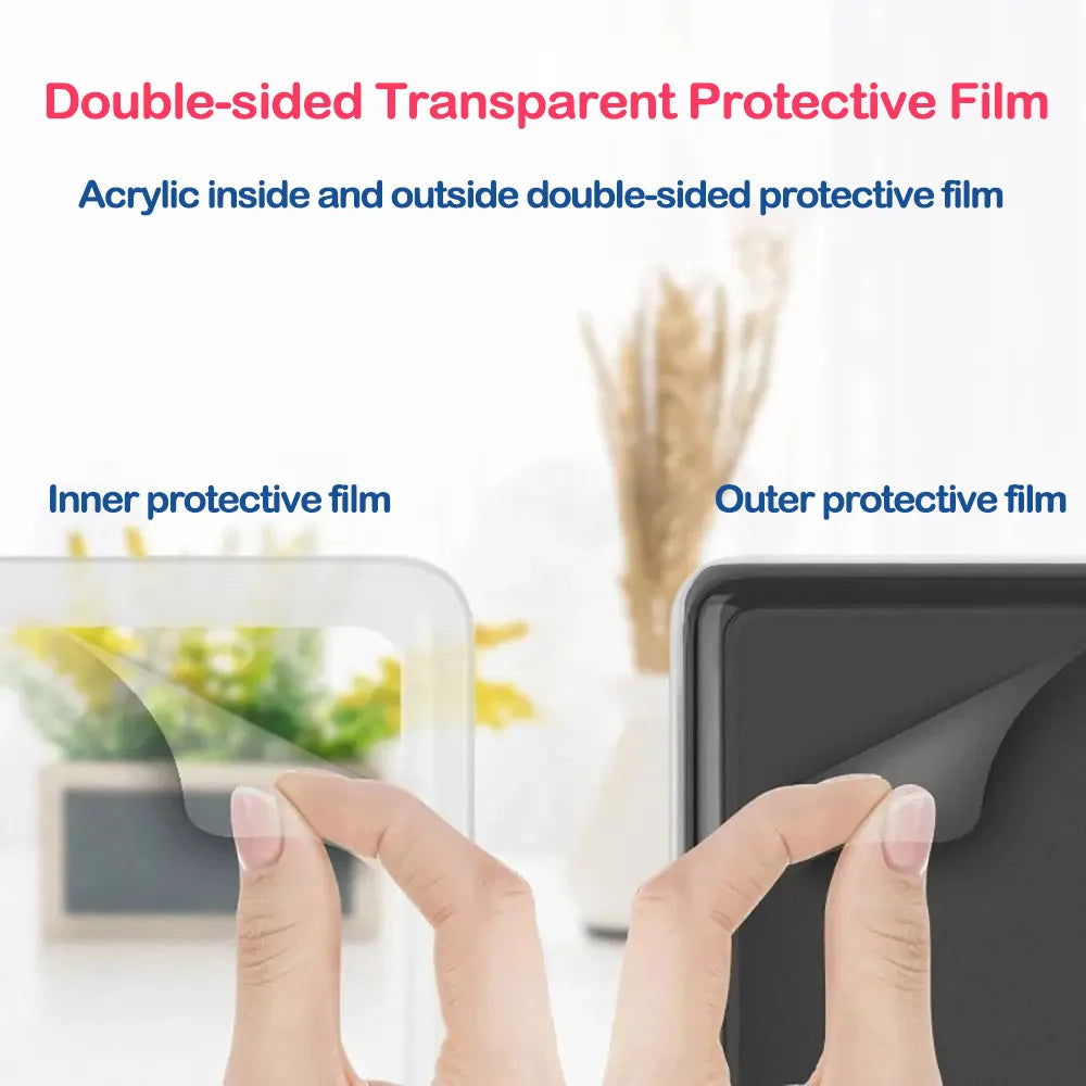 Hands are applying a double-sided transparent protective film to an electronic device.