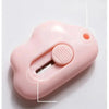A pink portable rabbit cloud letter opener and crafting tool with a slot for letters.