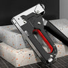A silver and black 4-in-1 manual nailing gun and construction stapler set resting on a textured surface.