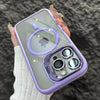 A purple MagSafe compatible phone case with a built-in camera bracket and lens cover is held by a hand.