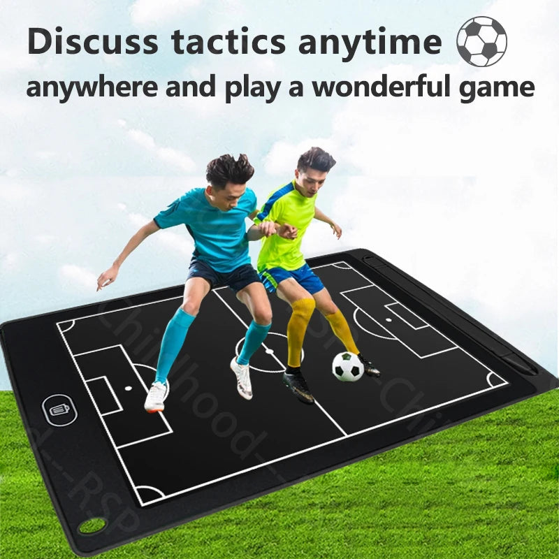 A portable coaching tablet displaying a soccer field layout on a green grass surface with two people playing.
