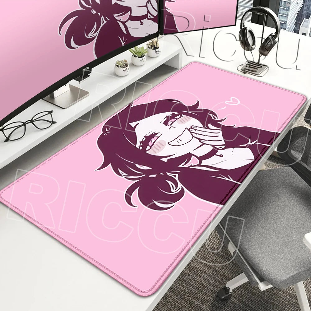 A pink gaming mouse pad featuring a stylized illustration of a dark purple-haired girl with pink highlights.