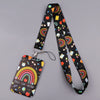 A black lanyard with a colorful rainbow pattern is shown, featuring a heart-shaped tag.