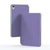 Clavier magnétique flottant violet pour iPad, vu en orientation verticale et horizontale.