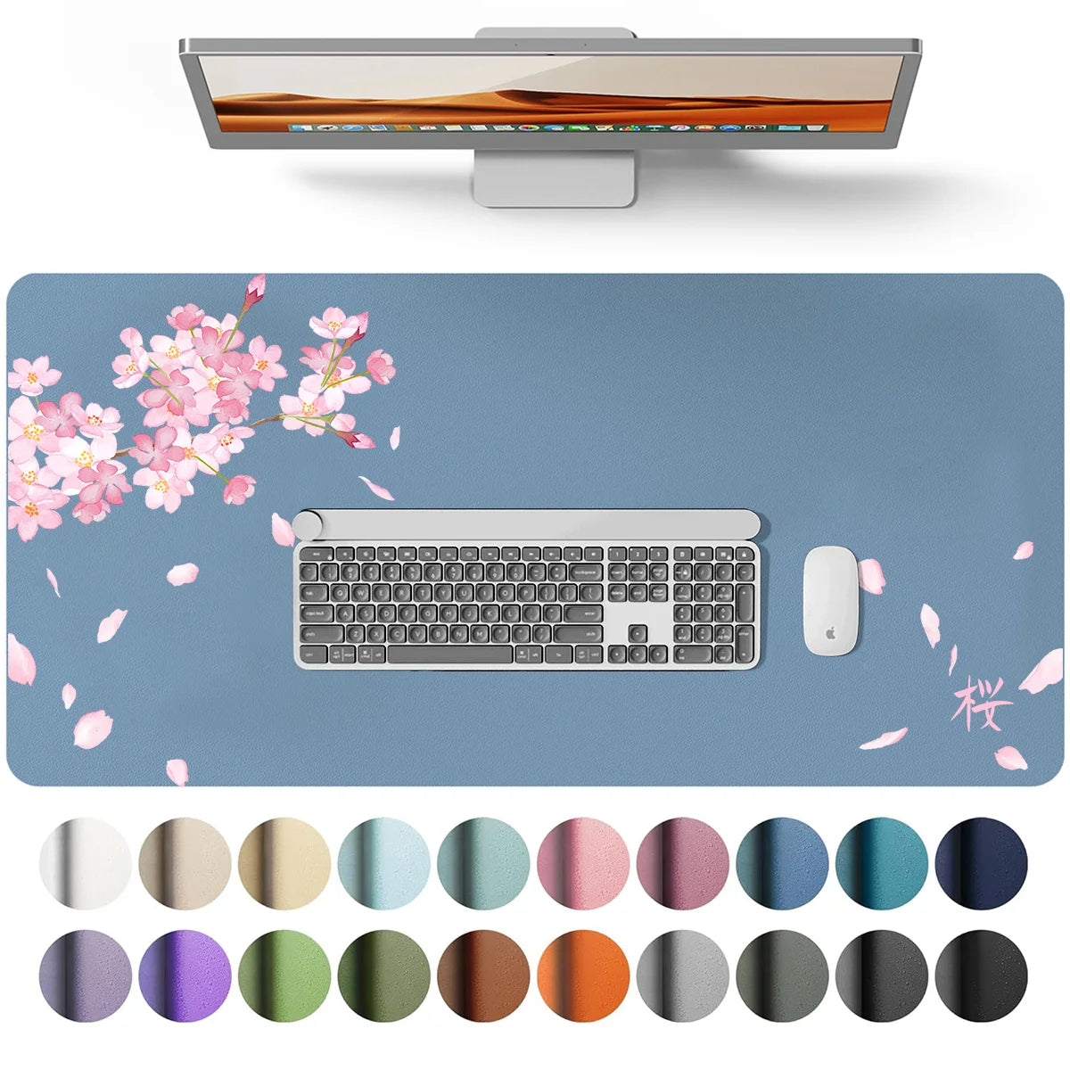 A large gray PU leather desk mat featuring a laptop and keyboard, surrounded by scattered pink petals and various colored cir