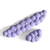 A light purple ergonomic memory foam wrist rest pad for desk and mouse, shown in profile.