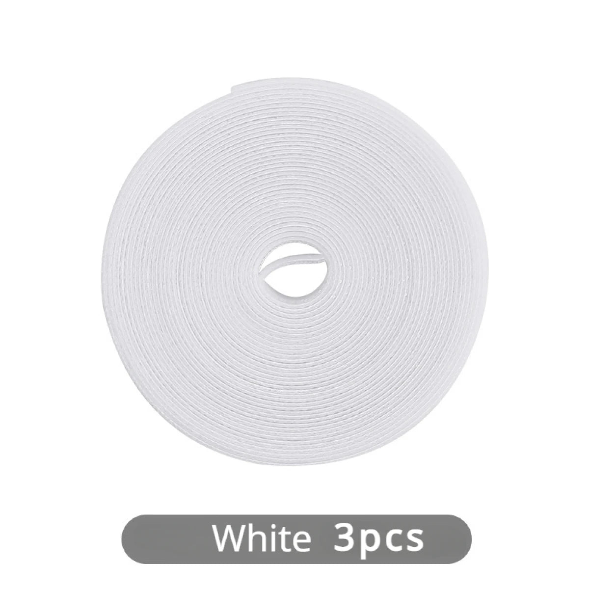 A roll of white reusable hook and loop cable ties, packaged in three pieces.