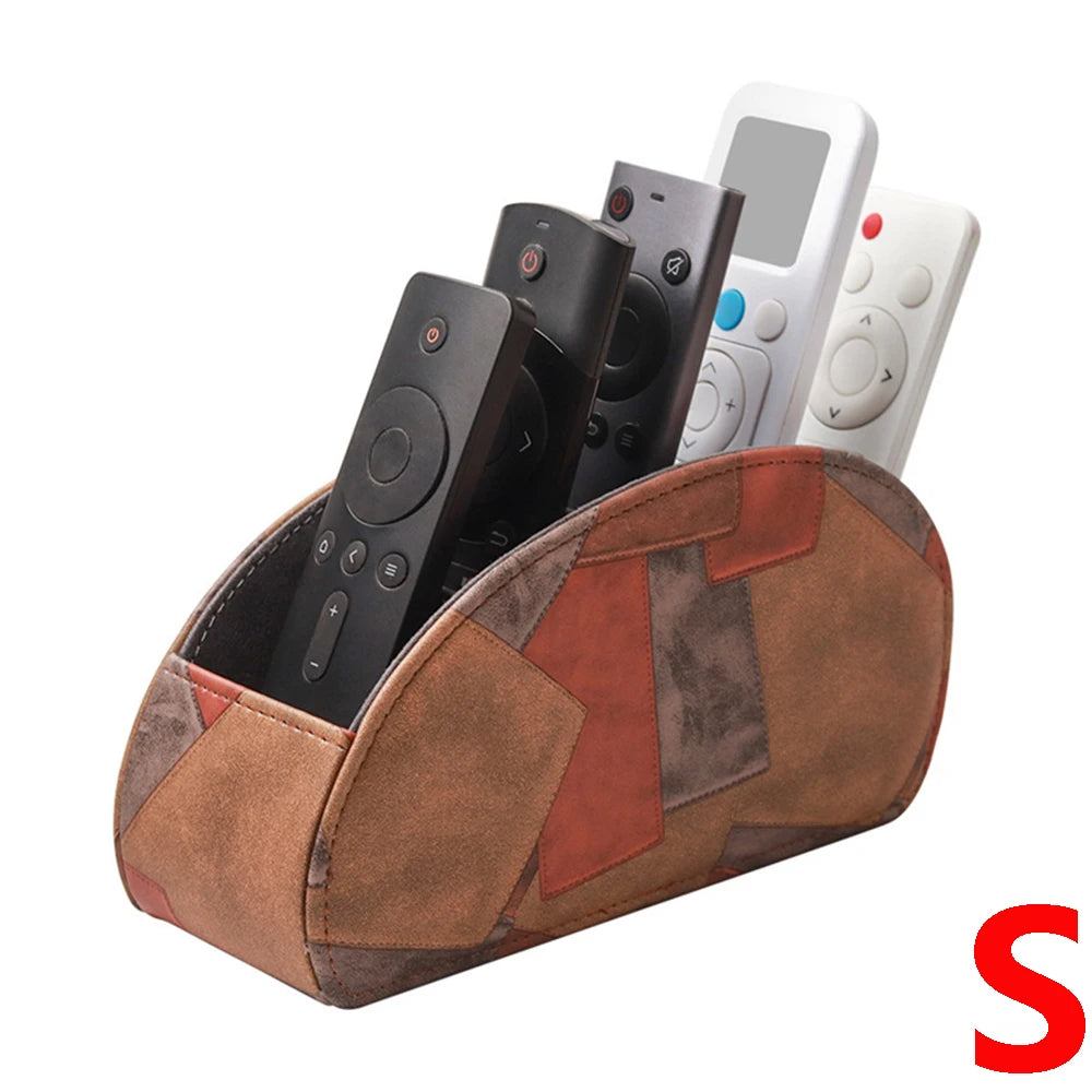 A PU leather remote control holder with five compartments is shown, containing a smartphone and a white remote.