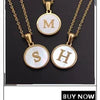 Gold-plated shell pearl beaded necklaces featuring initial charms M, S, and H.
