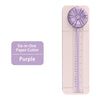 A purple six-in-one paper cutter with a clear measuring scale shown on a pink background.