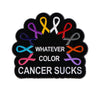 Black enamel pin featuring multiple colored ribbons symbolizing cancer awareness and support.