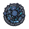 Enamel pin featuring the text What does it kill you mutates and tries again in blue and teal colors.