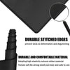 Black gaming mouse pad with stitched edges and a magnifying lens showing the durable material texture.