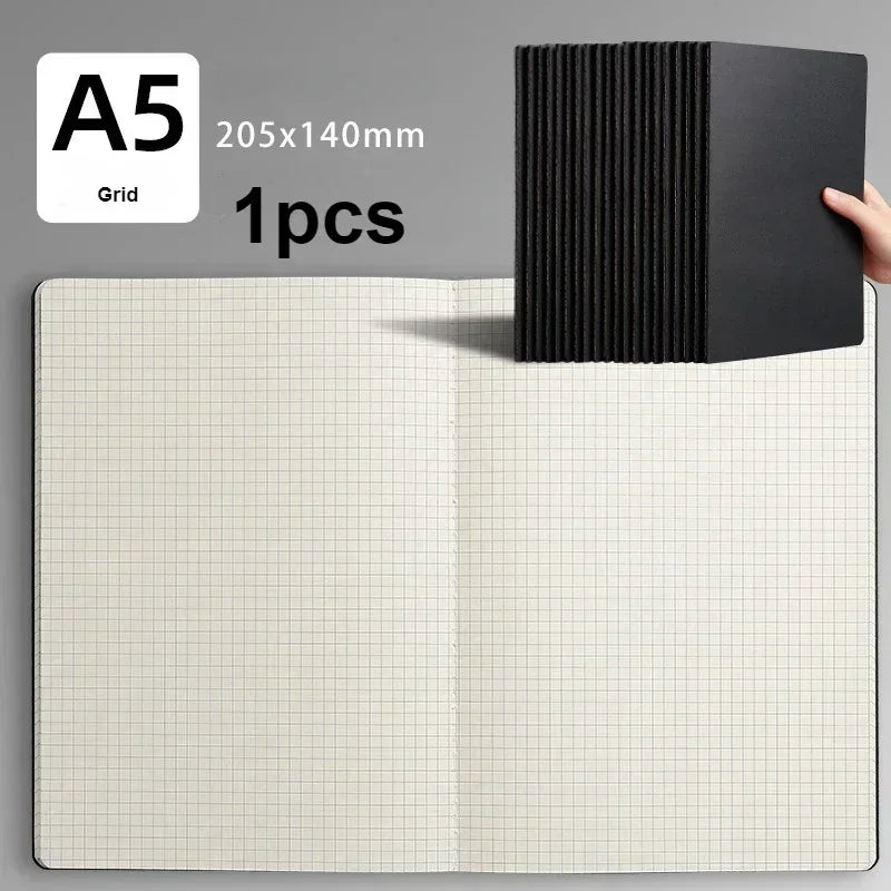 A5 grid notebook with a black cover is shown next to the notebook.