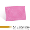 Pink A5 cutting mat with grid guides for double-sided printing