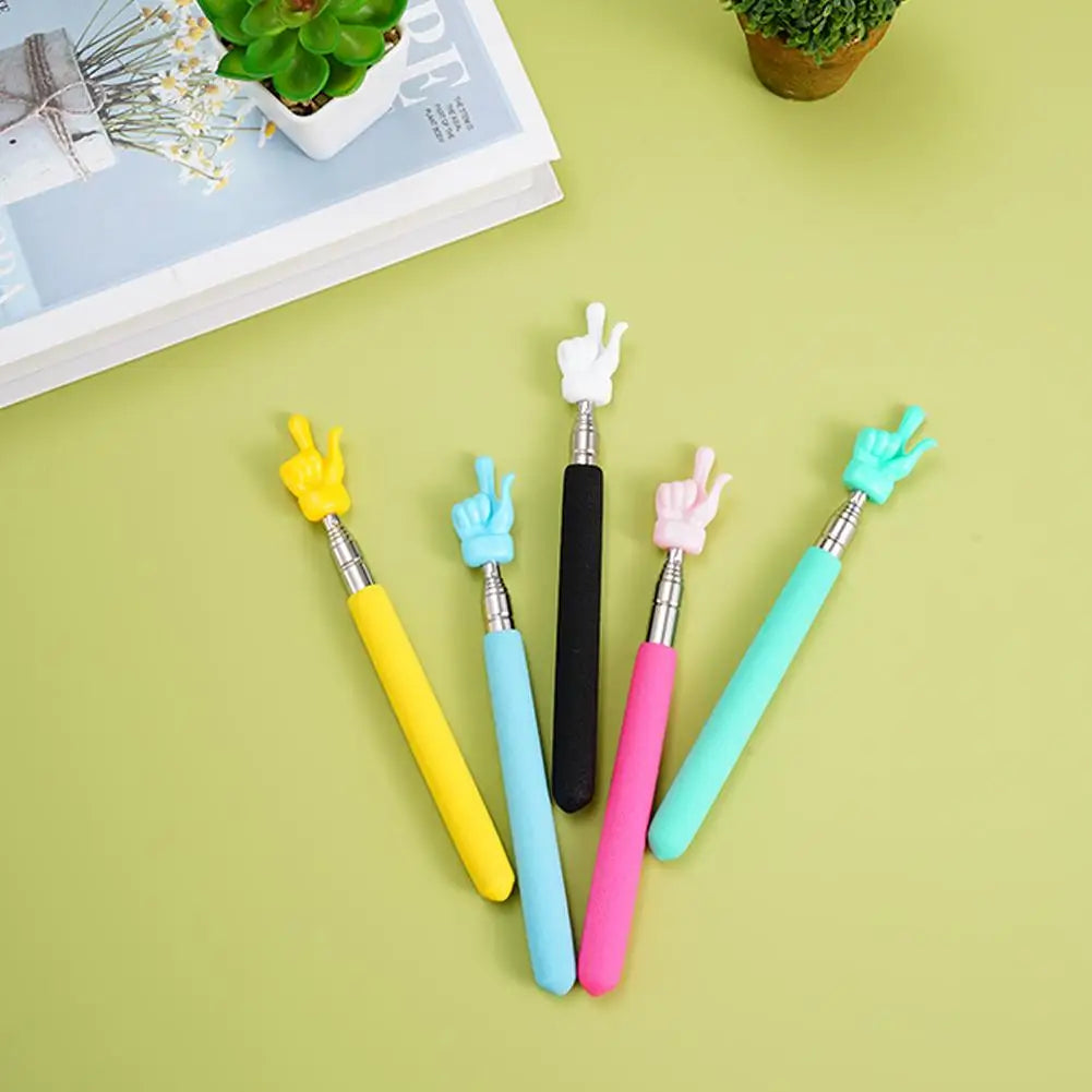 A collection of colorful retractable hand pointer sticks in yellow, blue, pink, and green against a light green background.
