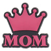 A pink crown and the letters MOM on a black charm set for a personalized gift.