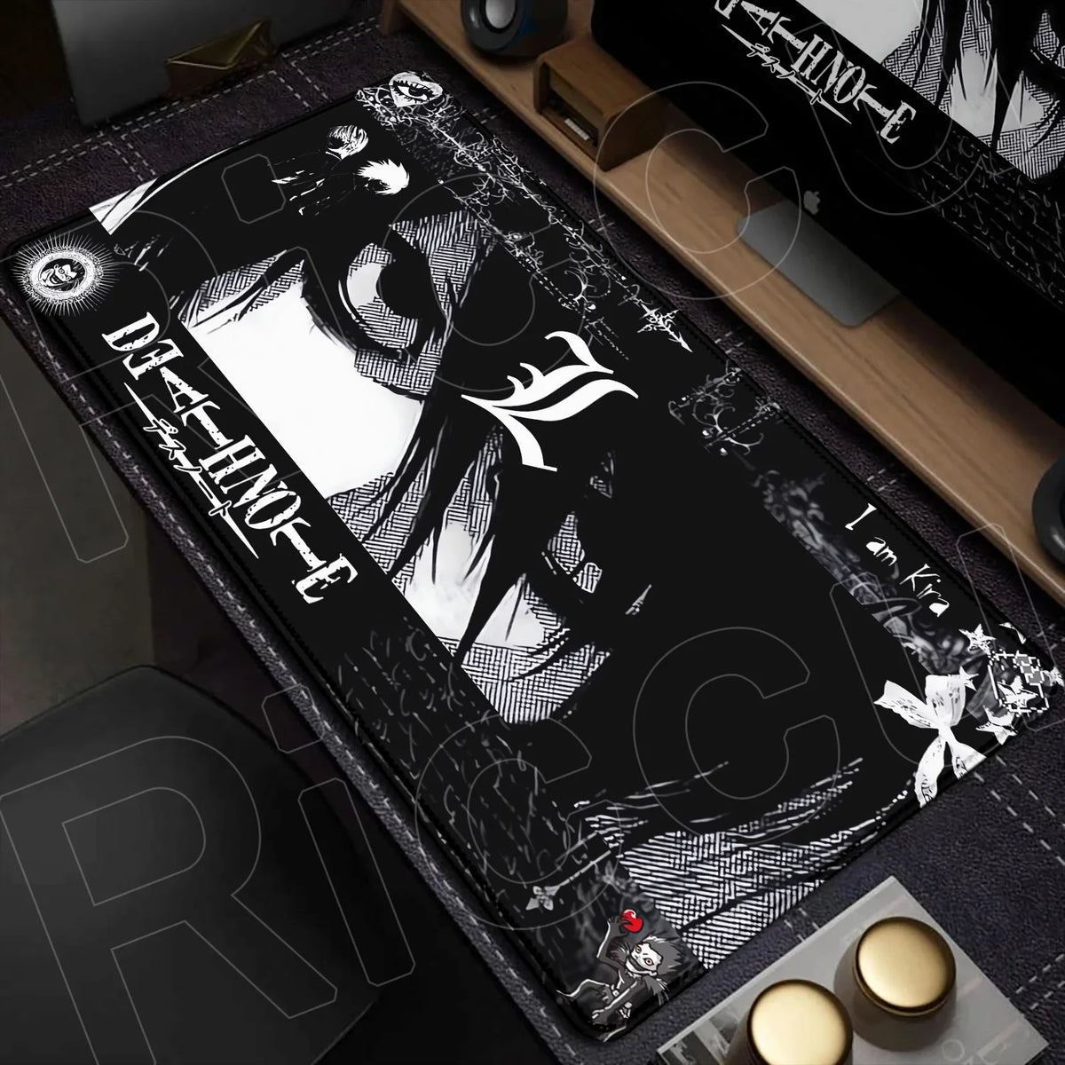 A black mouse pad featuring a stylized Death Note design with white and gray graphics, placed on a wooden desk surface.