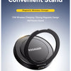 A black magnetic wireless charging stand with a circular base and a separate charging pad shown against a sunset background.