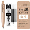 A package and several Uni-Ball One P gel pens are shown, featuring a light beige body and black tips.