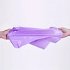 A hand holds a purple waterproof self-adhesive courier mailer bag, showing its flexible and protective nature.