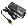 Black AC adapter for laptop computers with a power cord and plug.