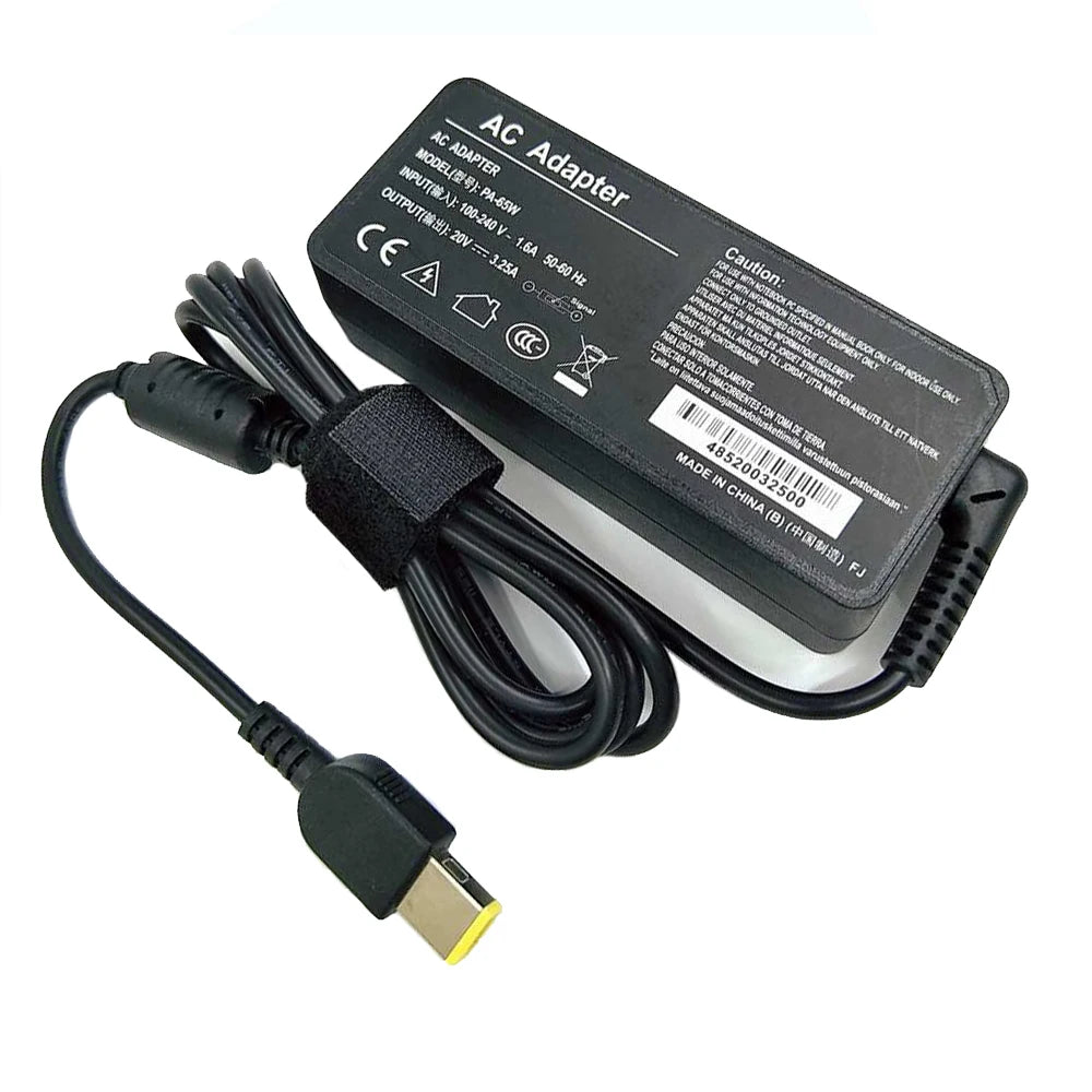 Black AC adapter for laptop computers with a power cord and plug.
