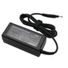 Black 65W AC adapter for laptop computers with a coiled power cord and plug.