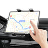 A hand is using a universal car air vent mount to hold and interact with a tablet displaying a map.