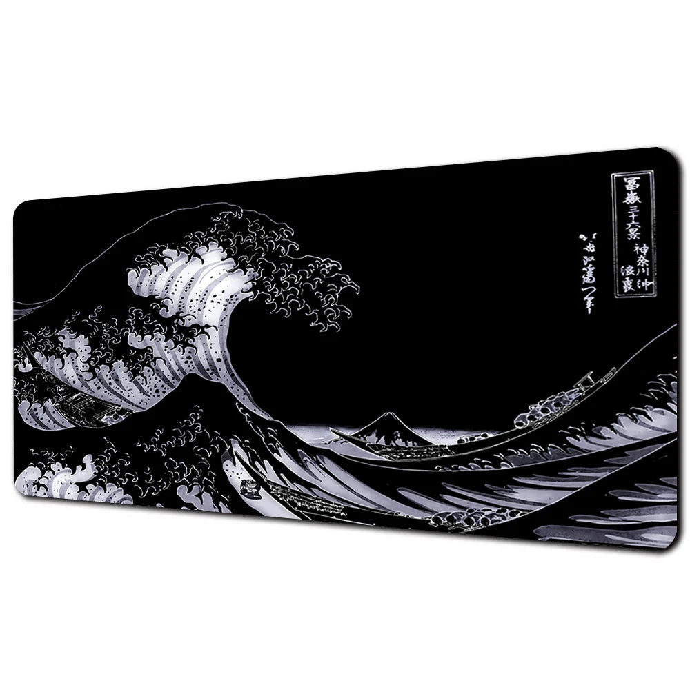 A black and white illustration of a large ocean wave on a desk mat.