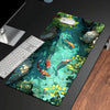 A green whale shark ocean-themed mouse pad with an anti-slip rubber base and a white computer mouse.