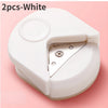 A white precision corner cutter tool is shown, opened to reveal the cutting blade.