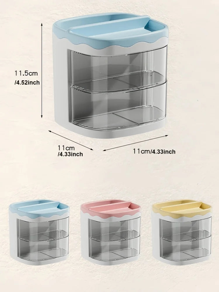 A set of three simple desktop pen holders in light blue, pink, and yellow for office or school use.