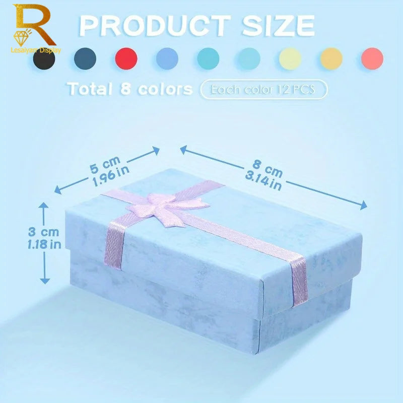 A light blue jewelry gift box is shown with dimensions marked, indicating a product size for 8 colors.