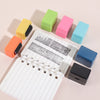 A collection of colorful privacy protection roller stamps in various shades of yellow, green, pink, and blue are arranged on 