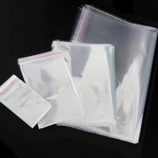 A stack of clear self-sealing plastic bags for jewelry, candy, and gifts.