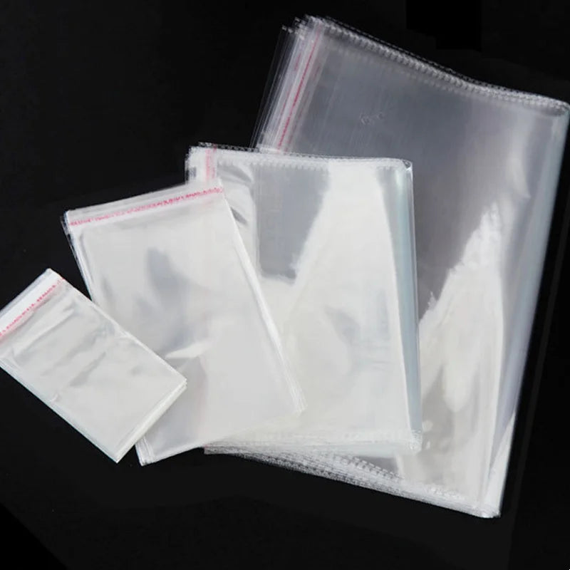 A stack of clear self-sealing plastic bags for jewelry, candy, and gifts.