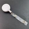 A silver retractable badge reel with a white circular clip and a clear acrylic design.