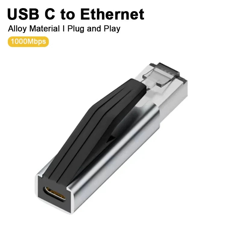 محول فضي من USB-C إلى إيثرنت مع غلاف أسود، يُعرض من الجانب.