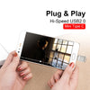 A hand holds a smartphone displaying a Plug & Play Hi-Speed USB 2.0 Mini Type C flash drive.