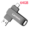 A silver Lenovo 64GB flash drive with a USB connector is shown against a black background.