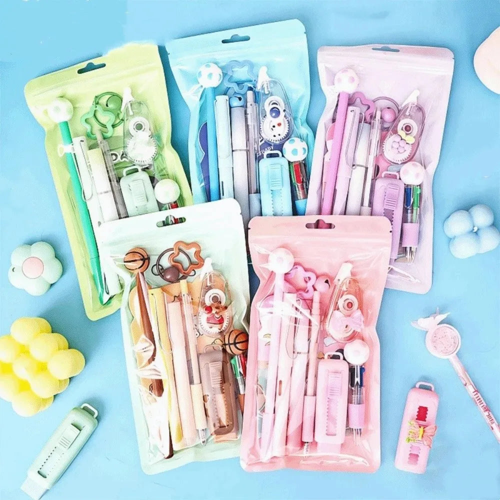 A pink and green 6-in-1 cartoon school stationery kit with various pens, pencils, and tools in clear plastic pouches.