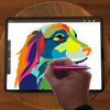 A hand holds a purple stylus pen drawing a colorful dog illustration on a digital tablet.
