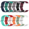 A variety of silicone watch bands in various colors including blue, green, gray, purple, black, and maroon are displayed.