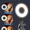 A tripod-mounted ring light with adjustable white, mixed, and warm light options for photography or video.